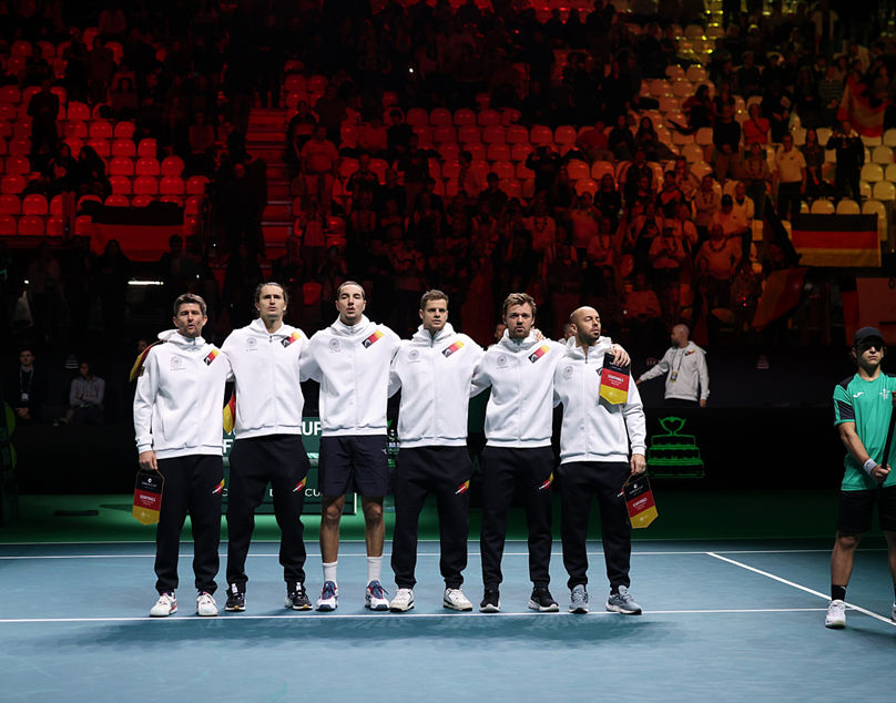 BOLOGNA, ITALY - NOVEMBER 22: Alexander Zverev, Jan-Lennard Struff, Yannick Hanfmann, Kevin Krawietz, Tim Puetz and captain Michael Kohlmann of Germany line up prior to the Davis Cup Semi-Final match between Spain and Germany at BolognaFiere Exhibition Centre on November 22, 2025 in Bologna, Italy. (Photo by Emmanuele Ciancaglini/Getty Images for ITF)