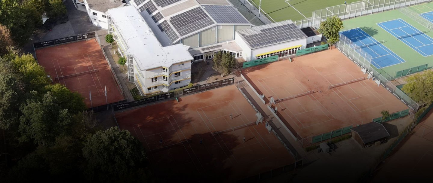 Aerial View of Sports Complex with Tennis Courts