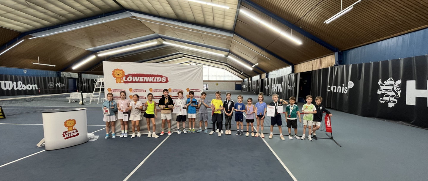 Group of Children at Indoor Tennis Event