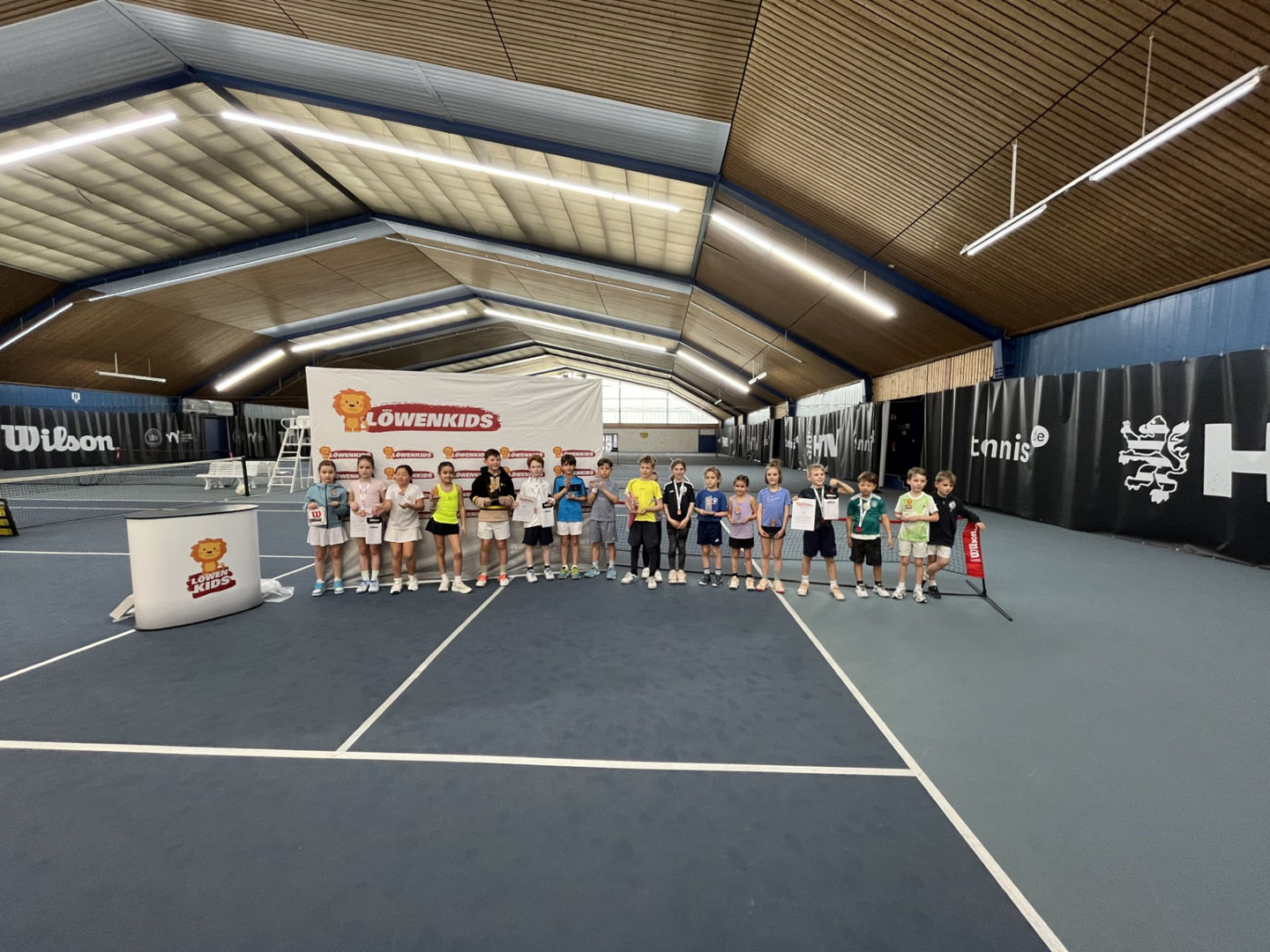 Group of Children at Indoor Tennis Event