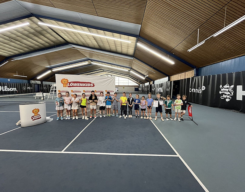 Group of Children at Indoor Tennis Event