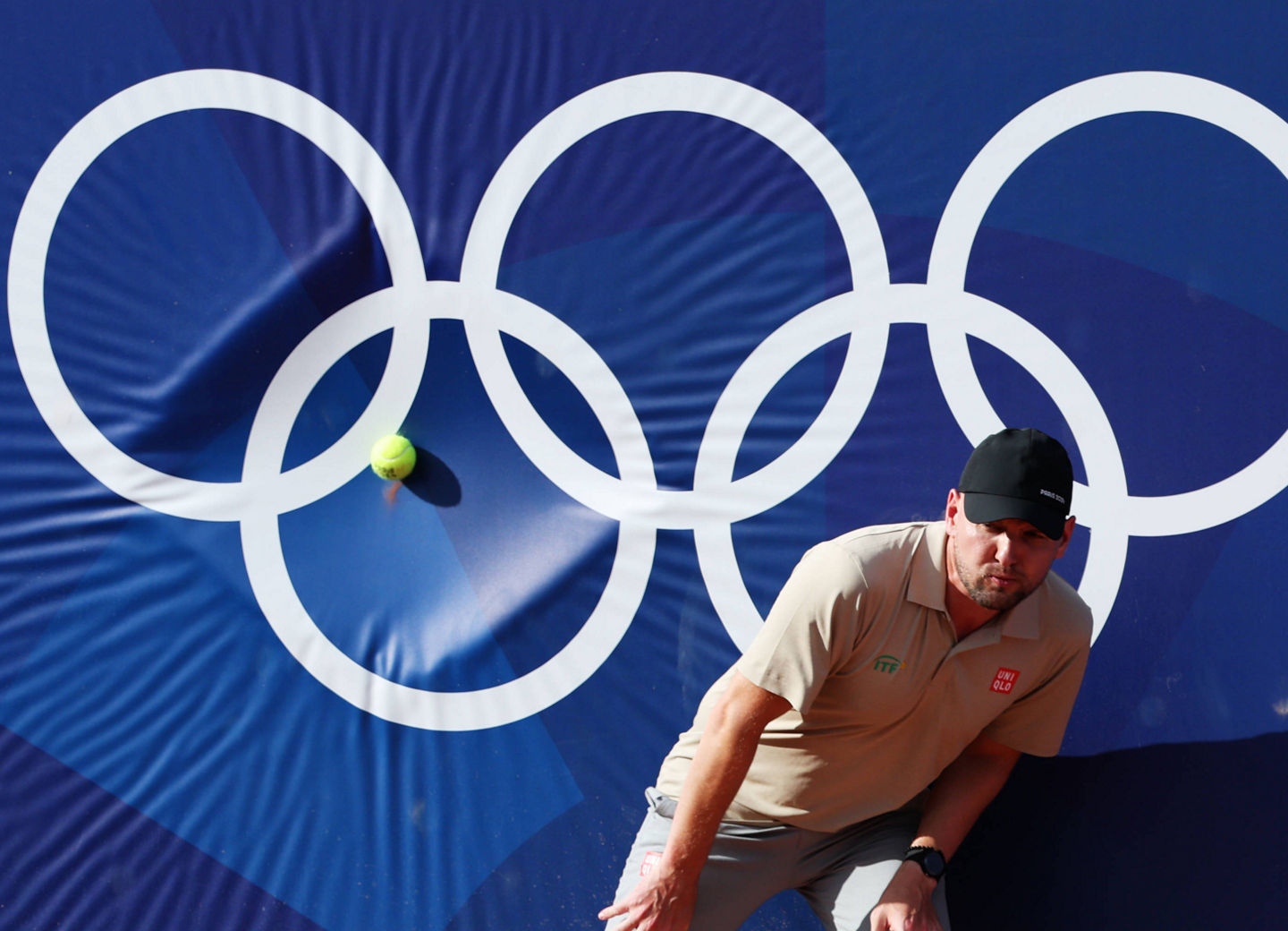 240728 -- PARIS, July 28, 2024 -- A tennis ball hits the logo of Olympic Rings competes during the men s singles first round match of tennis between Zhang Zhizhen of China and Tomas Machac of Czech Republic at Paris 2024 Olympic Games, Olympische Spiele, Olympia, OS in Paris, France, July 28, 2024. Gao Jing PARIS2024 FRANCE-PARIS-OLY-TENNIS gaojing PUBLICATIONxNOTxINxCHN