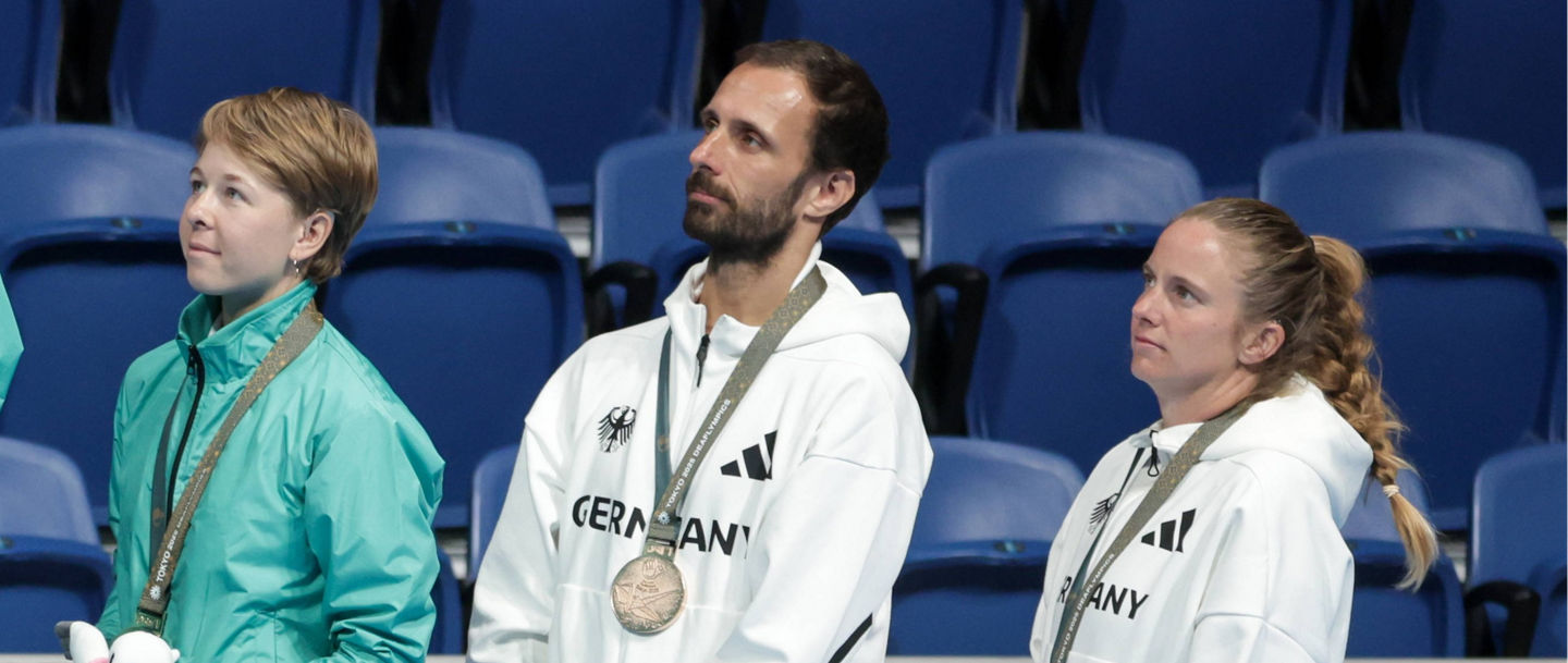 JAPAN, TOKYO - NOVEMBER 23, 2025: Silver medallists Jaroslav Smedek and Katerina Blascikova of the Czech Republic, gold medal winners, Russia s Dmitry Dolzhenkov and Polina Smirnova and bronze medallists Urs Breitenberger and Heike Albrecht-Schroeder of Germany L-R during the victory ceremony for the mixed doubles tennis event at Ariake Tennis Park during the 2025 Summer Deaflympic Games. Mikhail Sinitsyn/TASS PUBLICATIONxINxGERxAUTxONLY 85891595