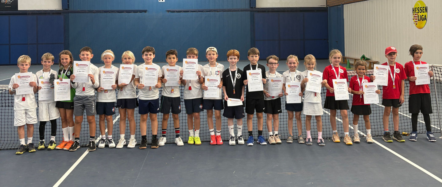 Group of children with certificates indoors