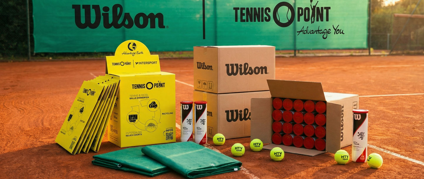 Wilson tennis equipment and Tennis Point boxes on court